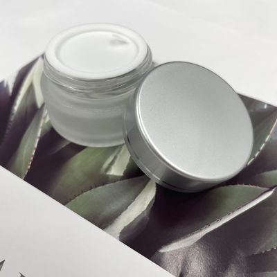 O cosmético 20g de vidro feito sob encomenda redondo range a altura de empacotamento 3.2cm do diâmetro 4.7cm